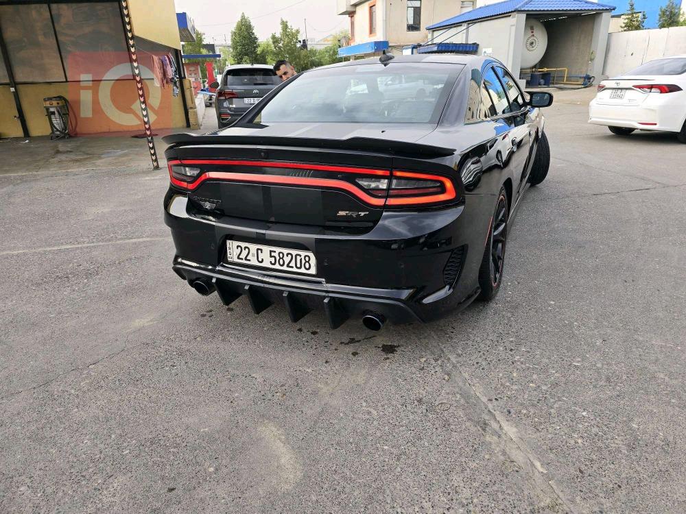 دۆج چارجەر